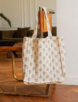Bolsa a rayas amarillas y flores