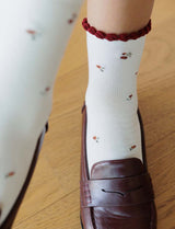 Ecru socks with burgundy flowers Loni