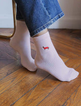 Chaussettes rose clair & teckel bordé
