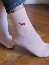 Chaussettes rose clair & teckel bordé