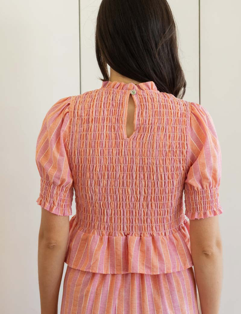 Coral intenso y lila Paloma